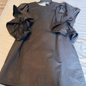 Black Ruffle Dress with a touch of elegance!